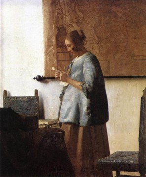 Femme en Bleu Lisant une Lettre Baroque Johannes Vermeer Peinture à l'huile